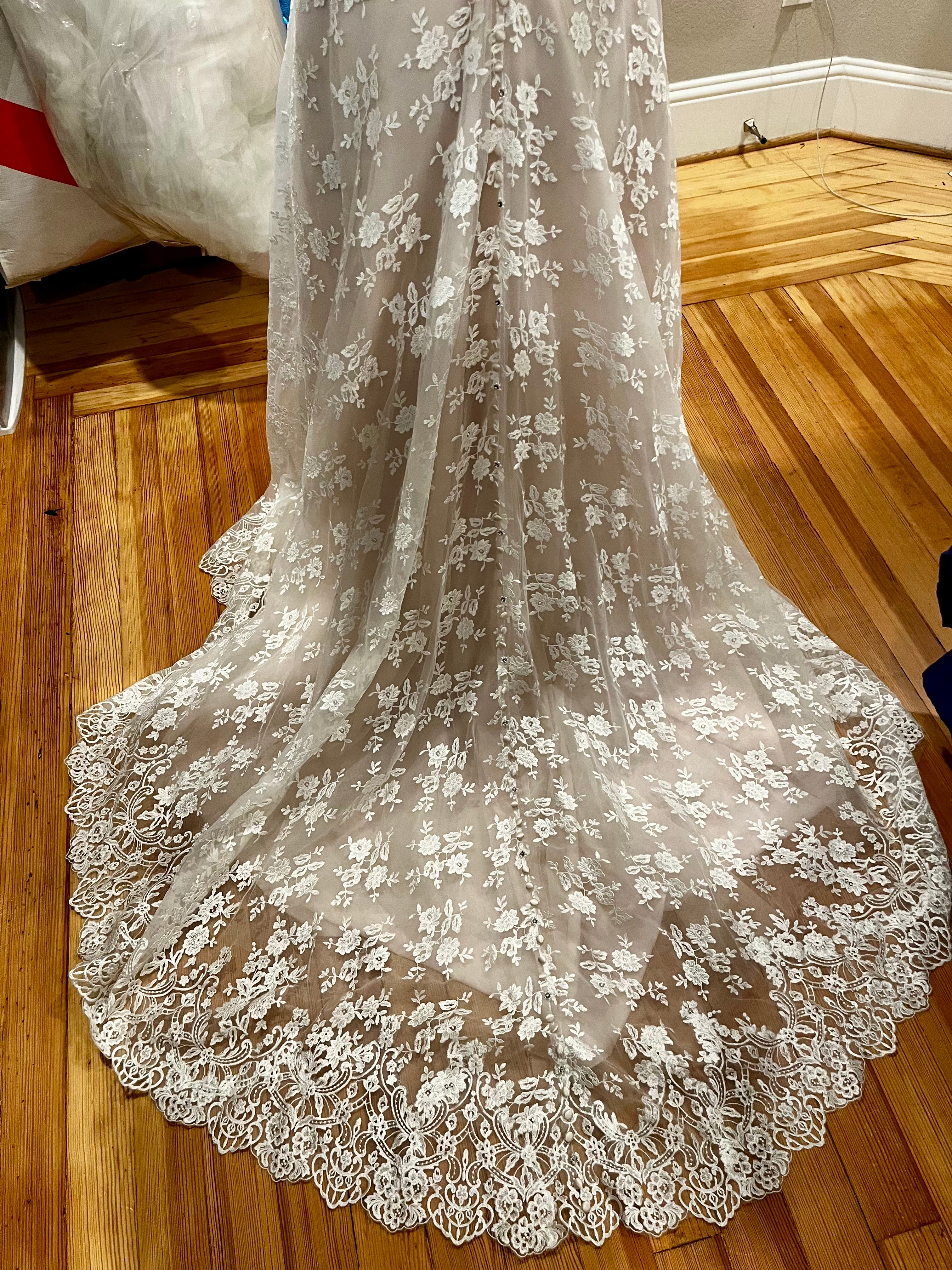 Elegant bridal gown by Allure Bridals, style number 8123, in champagne/ivory color, size 8. #05