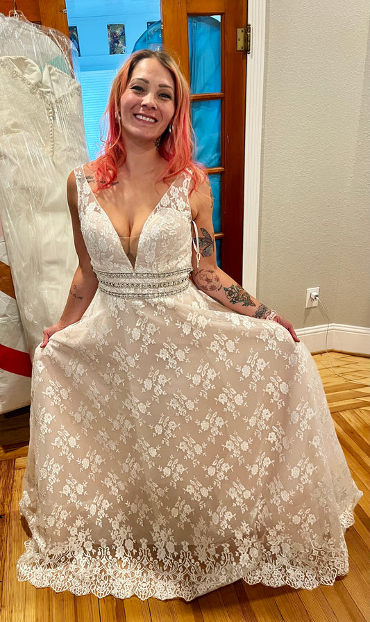 Elegant bridal gown by Allure Bridals, style number 8123, in champagne/ivory color, size 8. #05